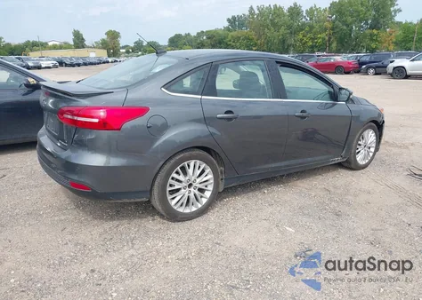 2017 Ford Focus Titanium z USA, uszkodzony, nr VIN 1FADP3J20HL238784